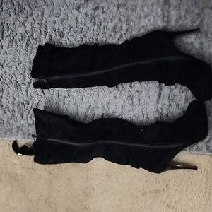 Black suede boots with heels
